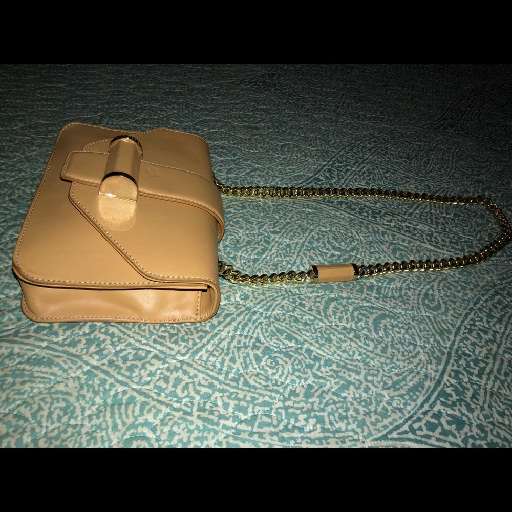 Yellow gold purse w/ gold chain strap